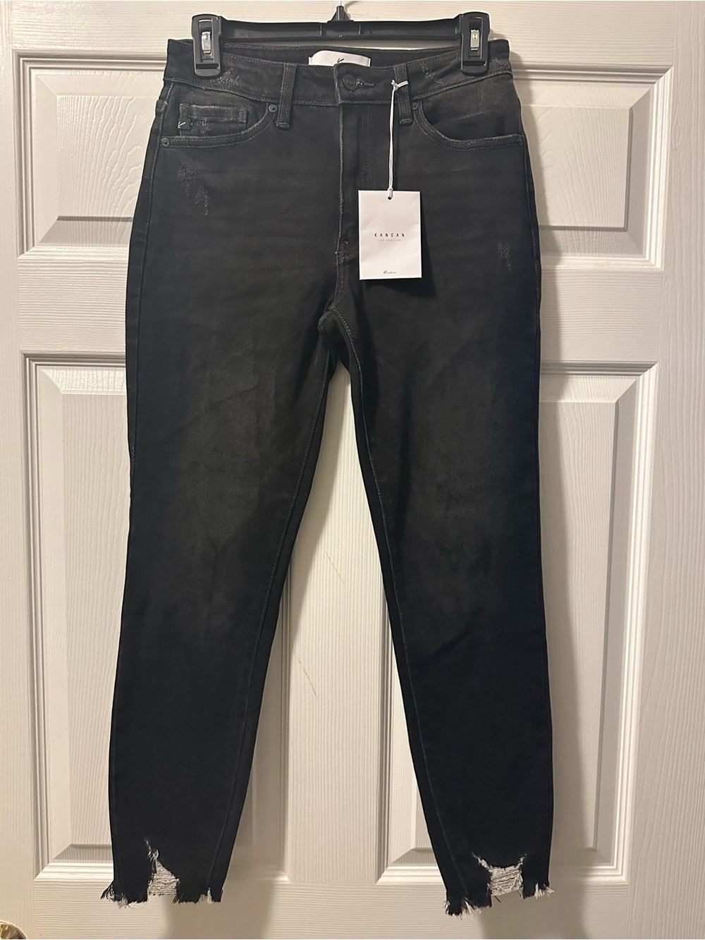 NWT Womenโs KanCan Black Skinny Jeans with Distressed Raw Hem - Size 28